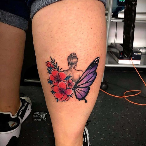 Butterfly and flower tattoos on leg