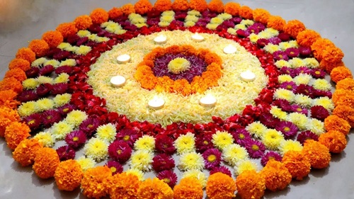 Easy Rangoli Designs for Diwali with Yellow and Red Flowers 1