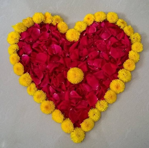 Easy Rangoli Designs for Diwali with Yellow and Red Flowers 5
