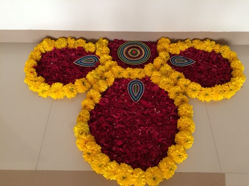 Easy Rangoli Designs for Diwali with Yellow and Red Flowers 3