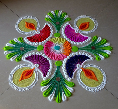 Simple rangoli design of flower in hall