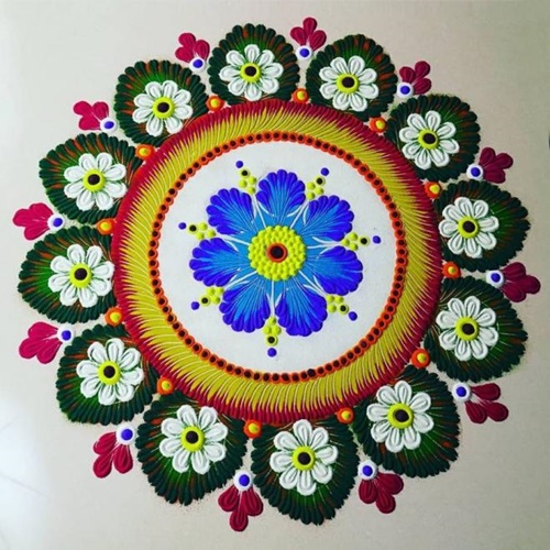 Simple Rangoli Designs with centre of blue flower