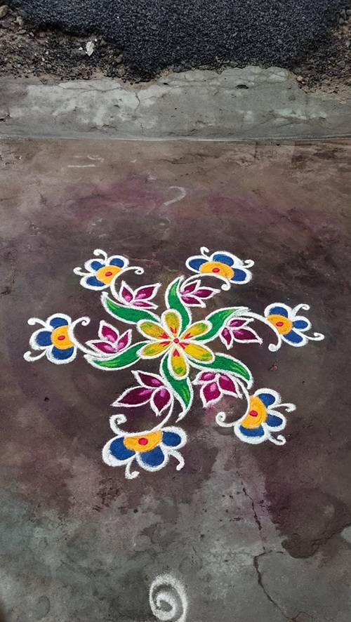 Simple Rangoli Designs of Flowers outside floor