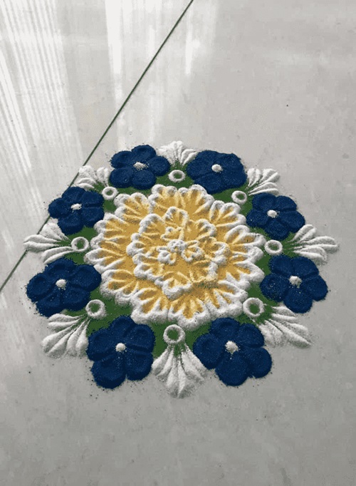 Simple adorable rangoli design of flower